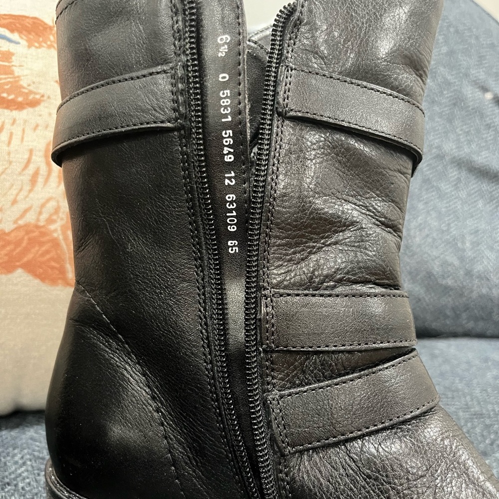 Black leather;mid calf;never worn out of house.